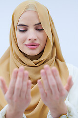 Image showing muslim woman making traditional prayer to God