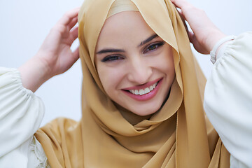 Image showing portrait of beautiful muslim woman isolated on white