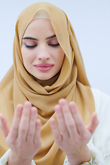 Image showing muslim woman making traditional prayer to God