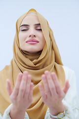 Image showing muslim woman making traditional prayer to God