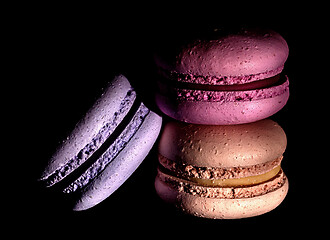 Image showing Heap of colorful macaroons darkened