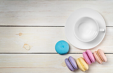 Image showing Macaroons and empty cup top view