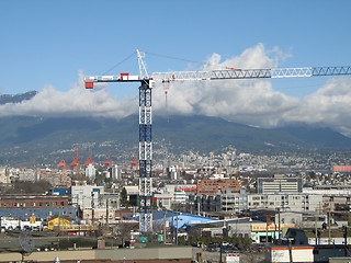 Image showing blue and white construction crane