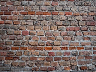 Image showing Detail of a medieval castle brickwall, dark red hues