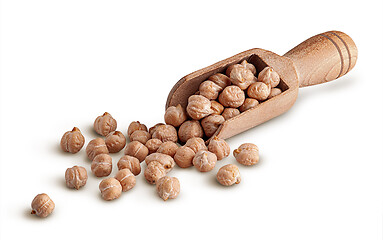 Image showing Wooden scoop with dry chickpeas