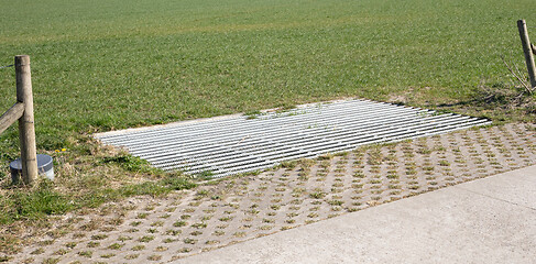 Image showing Cattle grid in ground