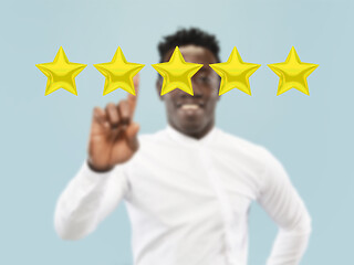 Image showing Man touching five star symbol to increase rating of company, app or service