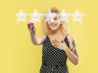 Image showing Woman touching five star symbol to increase rating of company, app or service