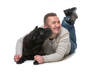 Image showing Man with shar pei dog