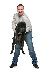 Image showing Man with shar pei dog