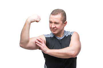 Image showing Man showing biceps muscles