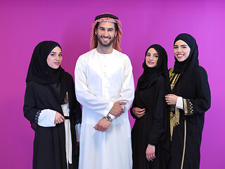 Image showing portrait of young muslim people isolated on pink