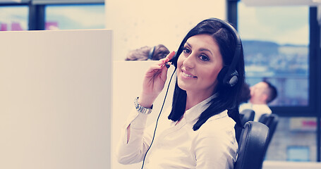 Image showing female call centre operator doing her job