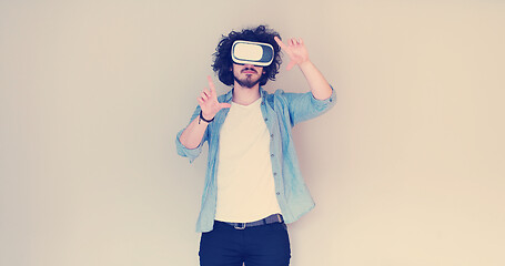 Image showing Man using headset of virtual reality