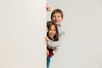 Image showing Banner with a surprised children peeking at the edge