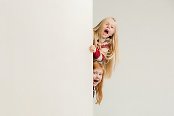 Image showing Banner with a surprised children peeking at the edge