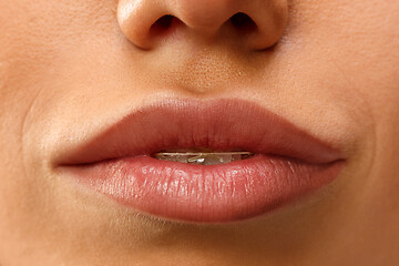 Image showing Beautiful woman face lips nose closeup beauty skin care concept