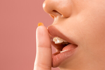 Image showing Beautiful young woman with teeth braces