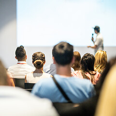 Image showing Male business speaker giving a talk at business conference event.