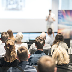 Image showing Male business speaker giving a talk at business conference event.