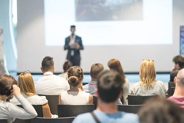 Image showing Male business speaker giving a talk at business conference event.