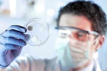 Image showing Scientist working in corona virus vaccine development laboratory research facility.