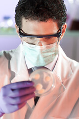 Image showing Scientist working in corona virus vaccine development laboratory research facility.