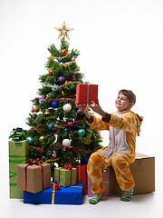 Image showing Girl holding a treasured New Year present