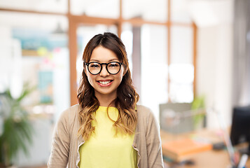 Image showing happy asian woman in glasses or student