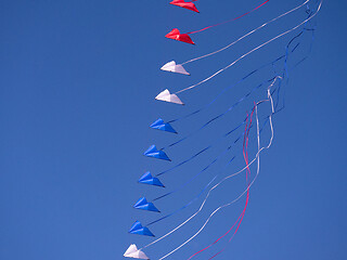 Image showing Red, white and blue kites