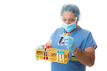 Image showing Healthcare worker or pathologist carrying blood test samples in 