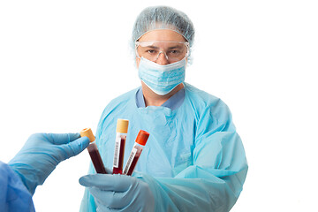 Image showing Nurse or doctor holding some patient pathology blood samples  