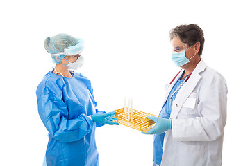 Image showing Doctor hands a laboratory pathologist swabs for testing