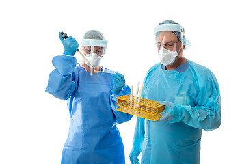 Image showing Laboratory workers testing  swabs