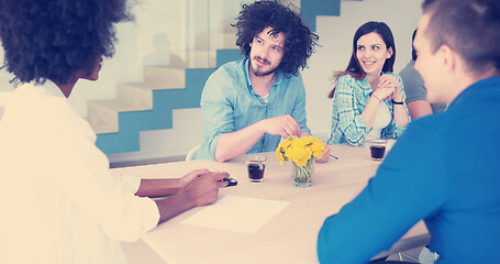 Image showing Multiethnic startup business team on meeting