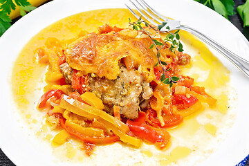 Image showing Chicken with pepper in white plate on napkin