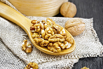 Image showing Walnuts in spoon on board