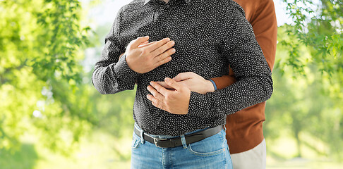 Image showing close up of hugging male gay couple