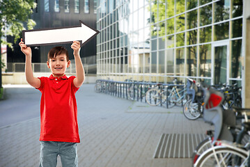 Image showing boy holding big white rightwards thick arrow