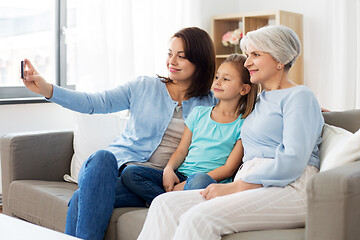 Image showing mother, daughter and grandmother taking selfie