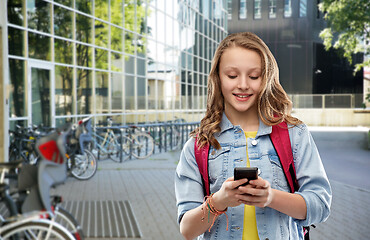 Image showing teen student girl with school bag and smartphone