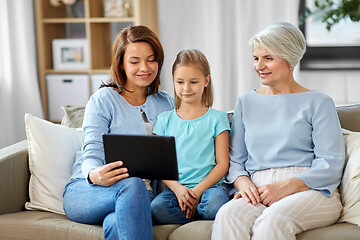 Image showing mother, daughter and grandmother with tablet pc