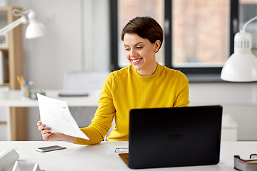 Image showing creative woman working on user interface at office