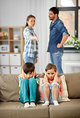 Image showing sad children and parents quarreling at home