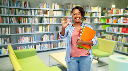 Image showing african american student woman at library