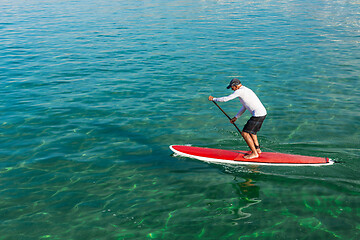 Image showing Senior man practicing paddle