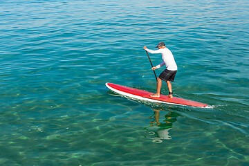 Image showing Senior man practicing paddle