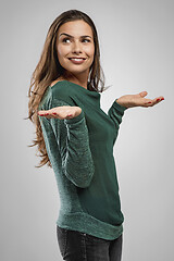 Image showing Beautiful woman with arms open