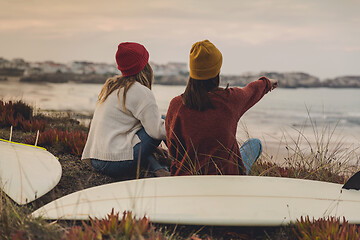 Image showing Surfer girls at the beach