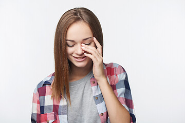 Image showing Portrait of Teen girl laughing to tears